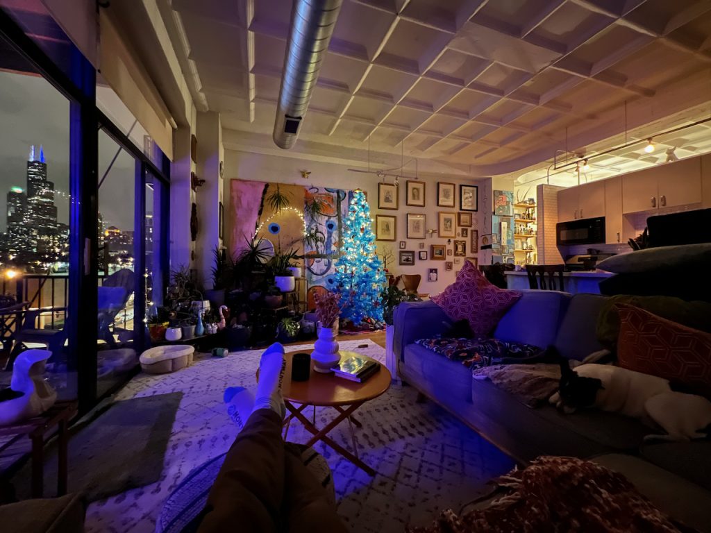 Evening living room with Art Deco ceiling and skyline windows