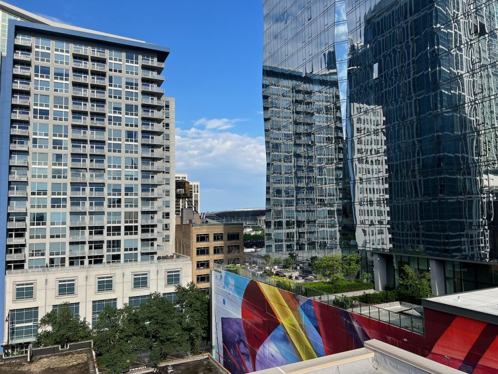 Rooftop view of South Loop towers and a colorful mural